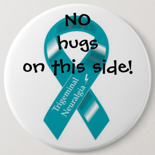 No hugs on this side button. 6 cm round badge