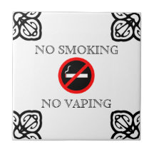 NO SMOKING SIGN ON SPANISH TILE