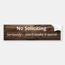 No Soliciting sticker. Wood grain