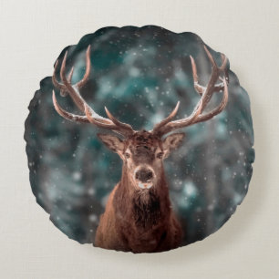 Noble deer male in winter snow forest. Artistic wi Round Cushion