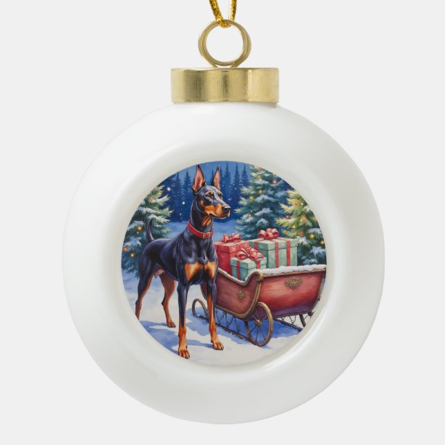 Noble Doberman Guarding Christmas Sleigh Winter Ceramic Ball Christmas Ornament (Front)