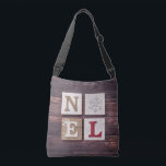 NOEL Crafty Christmas Snowflake Crossbody Bag<br><div class="desc">NOEL
Perfect for the crafty way to celebrate Christmas.  With faux wood grain background and nice neutral colours.</div>