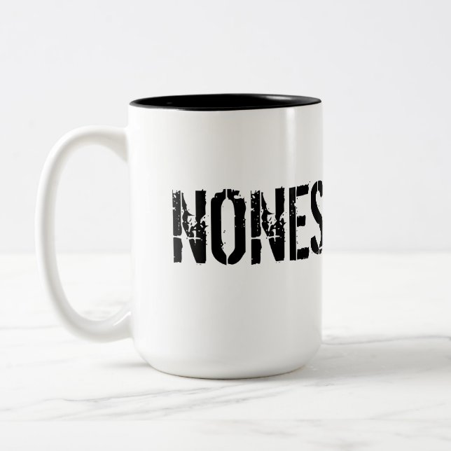 NONESSENTIAL Mug (Left)