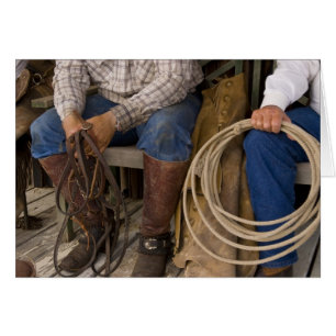 North America, USA. Cowboys relaxing and 2
