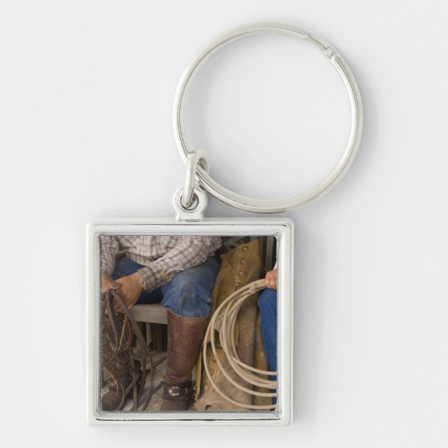 North America, USA. Cowboys relaxing and 2 Key Ring (Front)