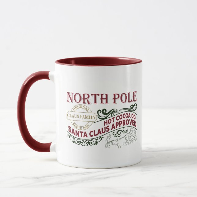 North Pole hot cocoa company Christmas  Mug (Left)
