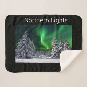 Northern lights during winter sherpa blanket