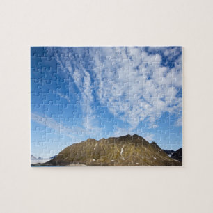 Norway, Svalbard, Clouds above steep cliffs Jigsaw Puzzle