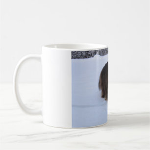 norwegian forest cat in snow coffee mug