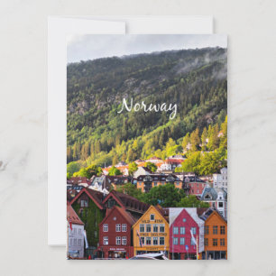 Norwegian town with mountains in the background card