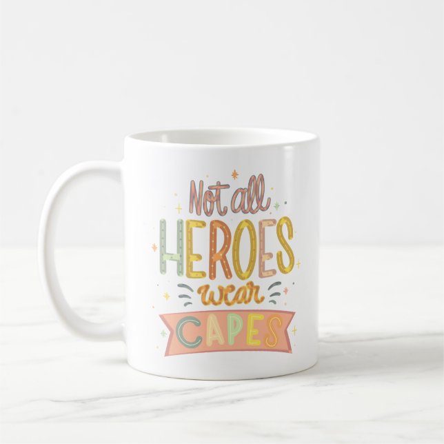 NOT ALL HEROES WEAR CAPES COFFEE MUG (Left)