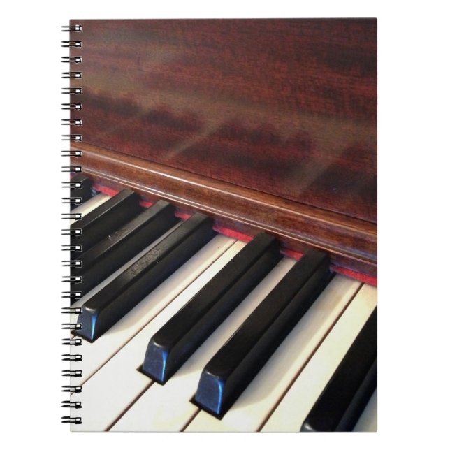 Notebook featuring piano (Front)