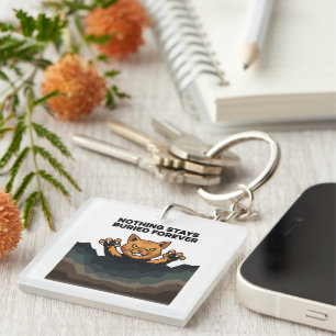 "NOTHING STAYS BURIED FOREVER" Orange Cat Key Ring