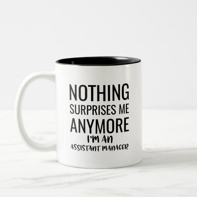 Nothing Surprises Me Anymore I'M An Assistant Mana Two-Tone Coffee Mug (Left)