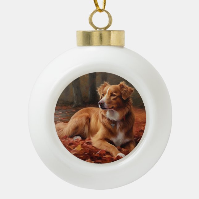 Nova Scotia Duck Terrier In Autumn Leaves Fall  Ceramic Ball Christmas Ornament (Front)