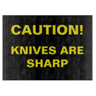 Novelty Caution. Knives are sharp. Cutting Board