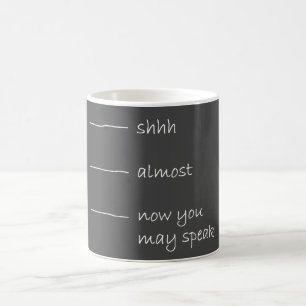 Now you may speak. coffee mug