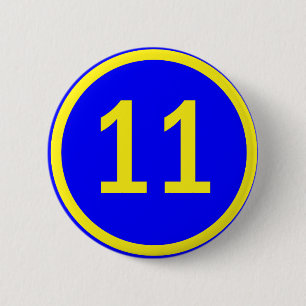 number 11 in a circle 6 cm round badge