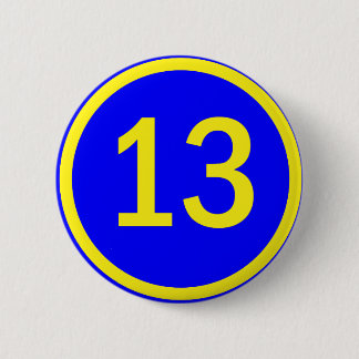 number 13 in a circle 6 cm round badge
