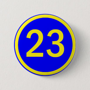 number 23 in a circle 6 cm round badge