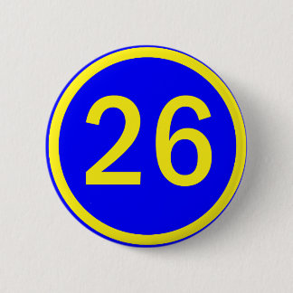 number 26 in a circle 6 cm round badge
