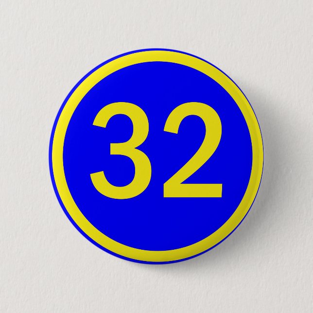 number 32 in a circle 6 cm round badge (Front)