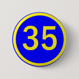 number 35 in a circle 6 cm round badge