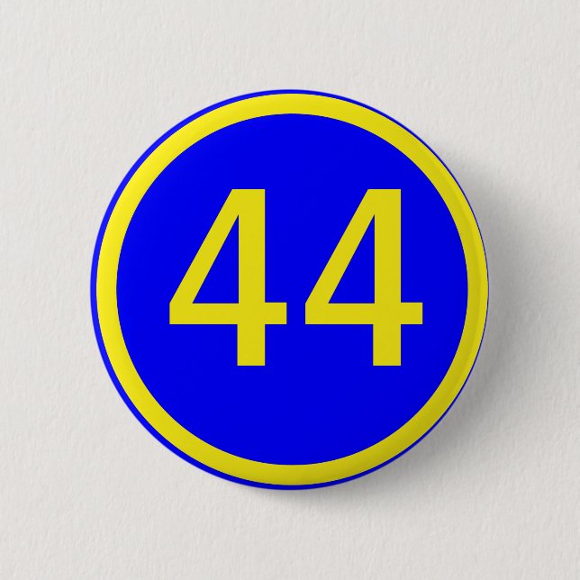 number, 44, in a circle 6 cm round badge (Front)