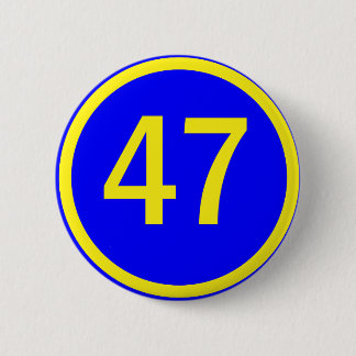 number, 47, in a circle 6 cm round badge