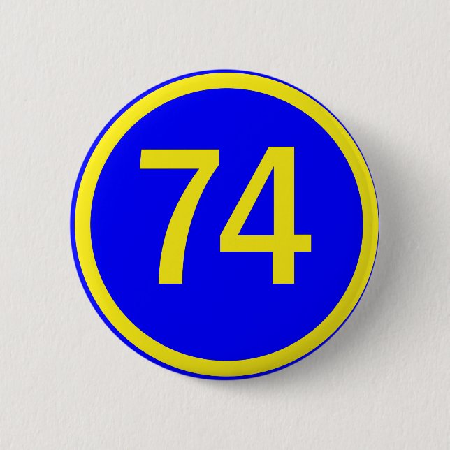 number, 74,  in a circle 6 cm round badge (Front)