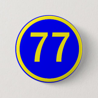 number, 77,  in a circle 6 cm round badge
