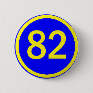 number, 82, in a circle 6 cm round badge