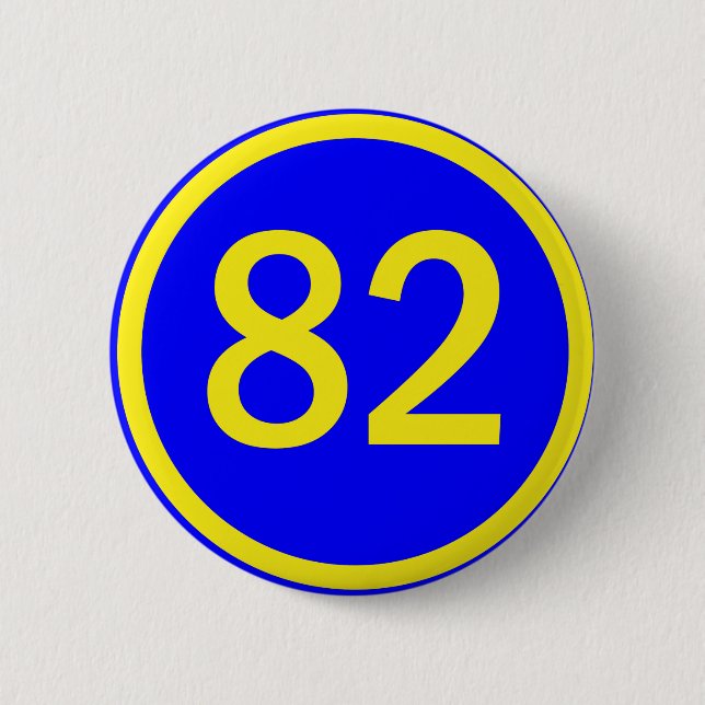 number, 82, in a circle 6 cm round badge (Front)