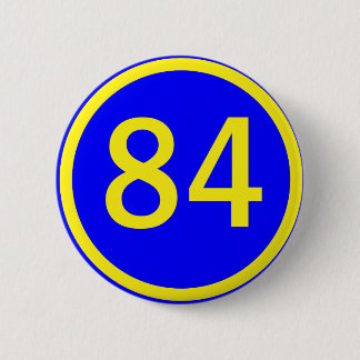 number, 84, in a circle 6 cm round badge