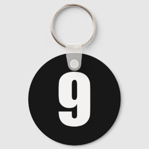 number 9 in white on black button keychain