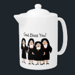 Nuns in Habits<br><div class="desc">Two whimsical and and silly catholic tea pot. Four nuns wearing traditional black habits and rosaries, waving and smiling saying, "God Bless You!". Back of globe has the same design. These snow globes are perfect for anyone who collects nun related items or for the favourite nun in your life. Great...</div>