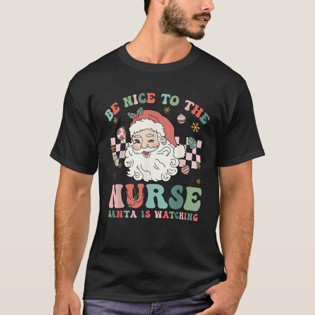 Nurse Christmas Be Nice To The Nurse Santa Is Watc T-Shirt (Front)