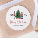 Nutcracker Christmas Sticker<br><div class="desc">This cute Merry Christmas sticker features adorable hand-painted watercolor nutcracker toy soldiers with presents under a beautifully decorated Christmas tree with customisable text for adding your name. Find matching items in the Christmas Nutcracker Invitations and Cards collection. (Easily remove the QR code from the back by simply checking the box...</div>
