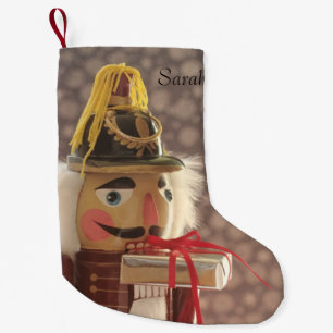 Nutcracker with silver gift small christmas stocking