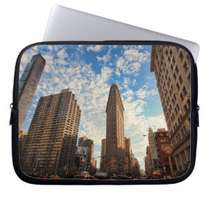 NYC's Flatiron Building, Wide View, Puffy Clouds Laptop Sleeve