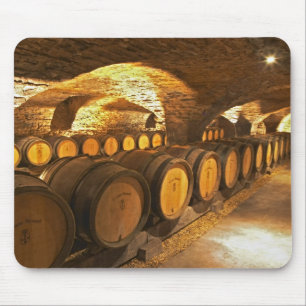 Oak barrles in the cellar at Domaine Comte Mouse Mat