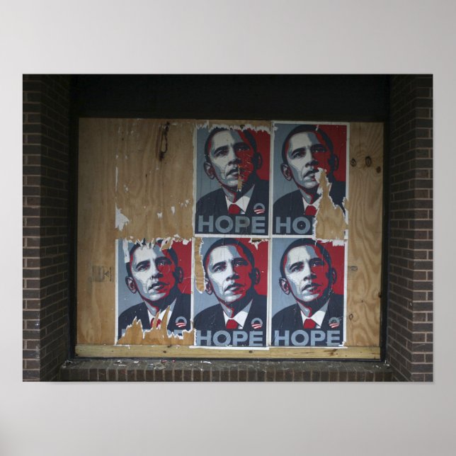 Obama signs in a boarded window of a closed (Front)