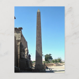 Obelisk in luxor temple against blue sky postcard
