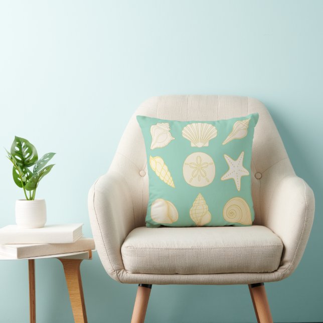 Ocean green throw pillow with seashells  (Chair)