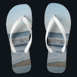 Ocean Waves Blue Sky Beach Sand Flip Flops<br><div class="desc">Pretty Blue Sky with Light Fluffy White Clouds, Blue Sea, Crashing Ocean Waves and Beach Sand Unisex Flip Flops. Shown with Wide White Straps and White Footbed. See options for flip flops in Slim Straps for more strap colours. Perfect for your summertime fun, trips to the beach, vacations, honeymoon or...</div>