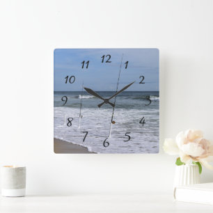 Ocean waves breaking on surf square wall clock