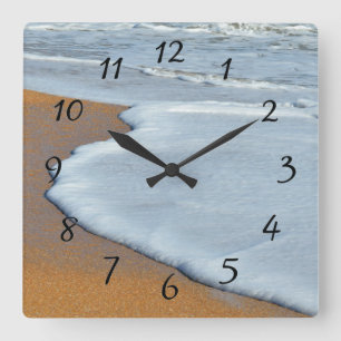 Ocean waves breaking on surf square wall clock