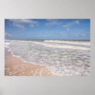 Ocean Waves Covering The Sand On The Beach Poster
