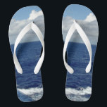 Ocean Waves Fluffy White Clouds Blue Sky Flip Flops<br><div class="desc">My Original Photography Design. Pretty Blue Sky with Fluffy White Clouds, Blue Sea and White Foam Ocean Waves Unisex Flip Flops. Click CUSTOMIZE IT to Personalise with your name or text. Shown with Wide White Straps and White Footbed. Choose your style flip flops from options (Slim Straps comes in different...</div>