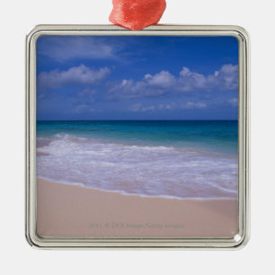 Ocean waves foaming onto sandy beach metal tree decoration